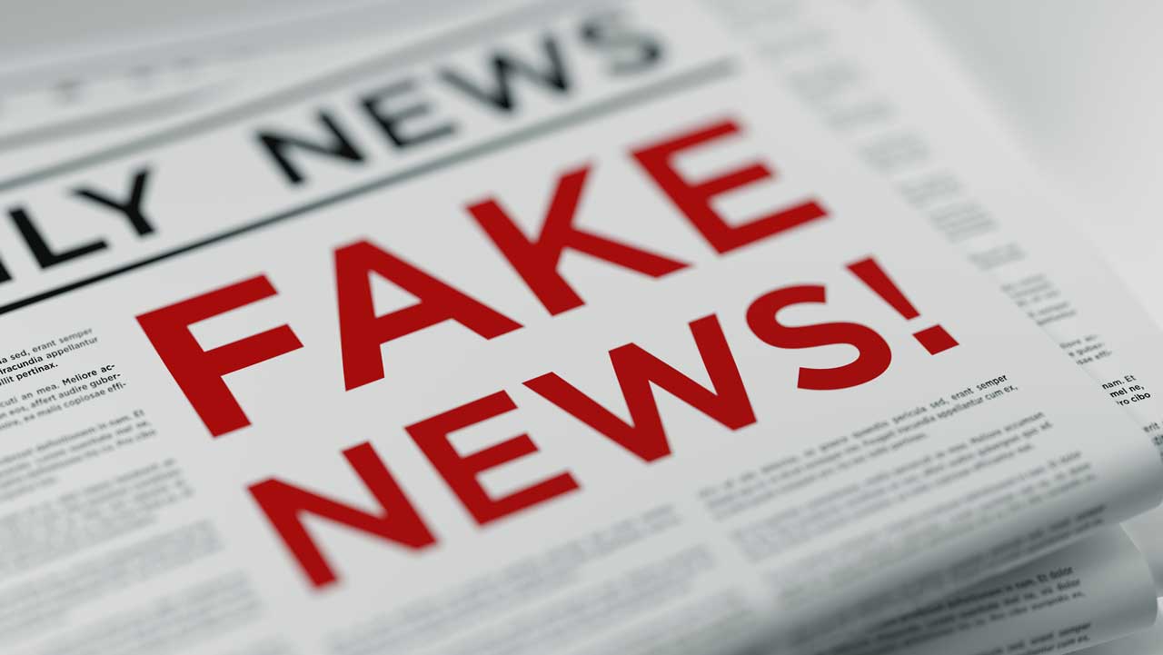 fighting fake news newspaper stack