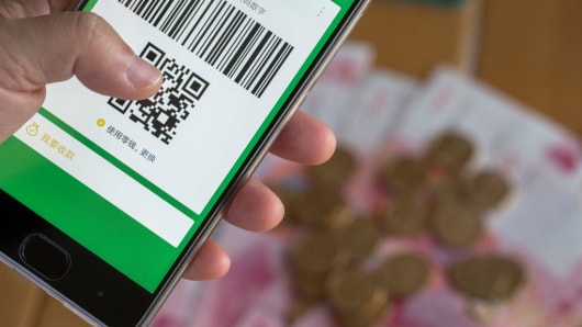 Image 1 : En Chine, de plus en plus de mendiants encaissent les dons par QR code