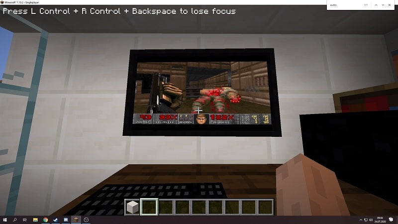 Image 1 : Minecraft : un mod permet d’émuler Windows 95 et de jouer à Doom sur un PC du jeu