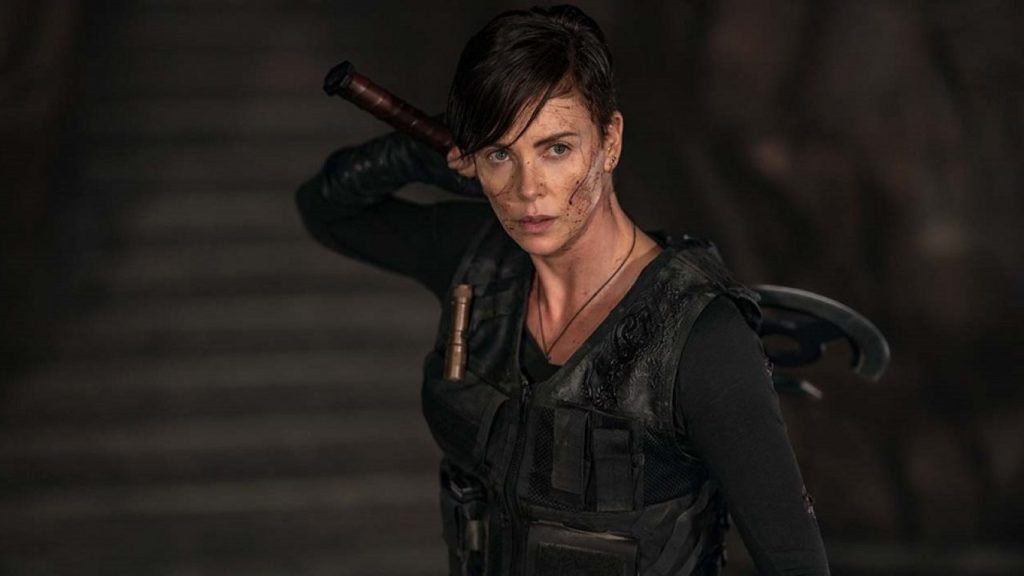 Netflix The Old Guard film Charlize Theron suite écriture scénario Greg Rucka
