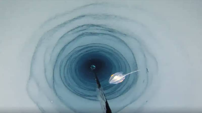 Researchers used hot water to drill two holes in a thick sheet of ice - credit: British Antarctic Survey