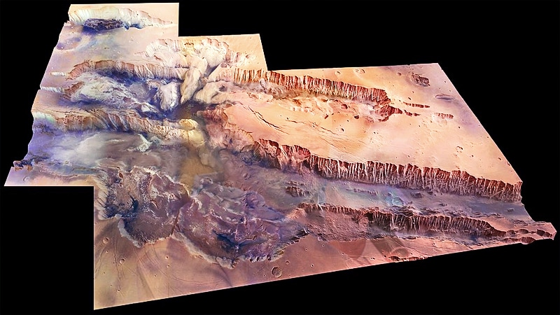 Valles Marineris, vu à un angle de 45 degrés par rapport à la surface dans des couleurs presque vraies. L'image couvre une superficie de 630 000 km². Crédits : ESA
