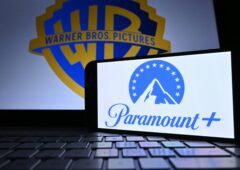 Le logo de Paramount+ devant celui de Warner Bros., alors que les actionnaires de WBD viennent de valider le rachat pour 111 milliards de dollars.